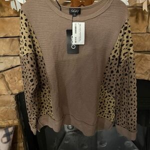Gigio Animal Print top. Size medium. NWT